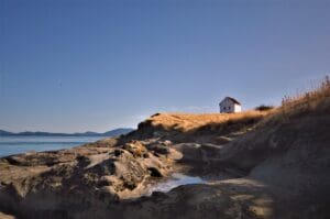 A small house on the side of a hill.